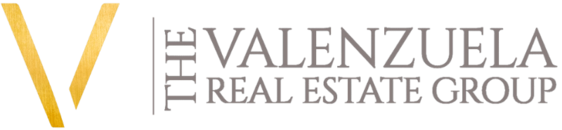 The Valenzuela Real Estate Group Logo