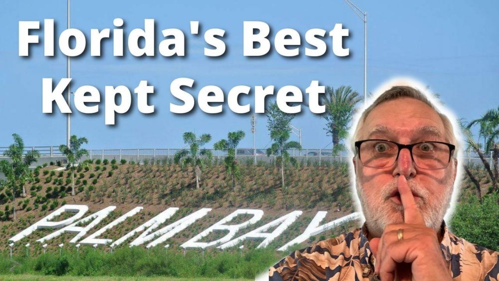 Photo of Marty Piatkowski, broker/owner of Mr Palm Bay Realty, making a "shushing" expression. Above him are the words "Florida's Best Kept Secret".